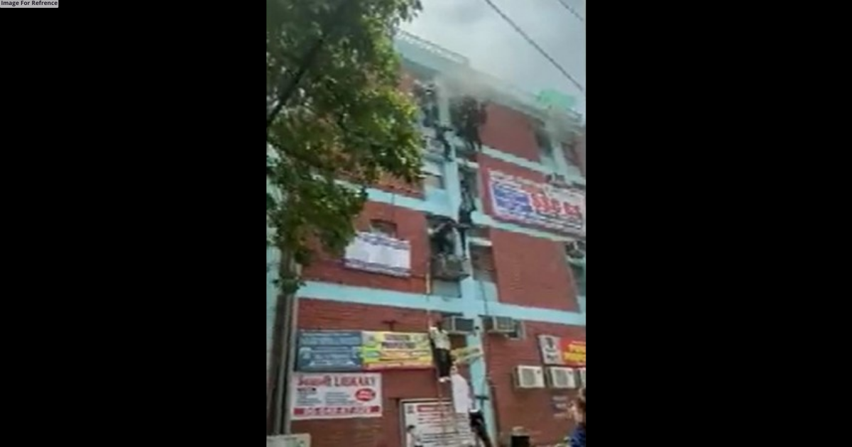 Fire breaks out at building in Delhi's Mukherjee Nagar, people rappel down for safety